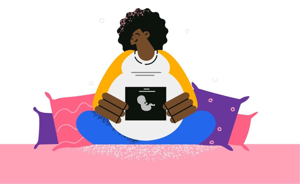 Woman holding ultrasound.